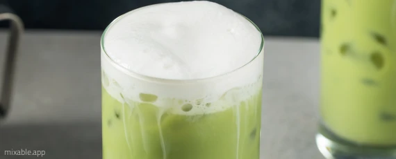 Matcha latte with milk foam on top